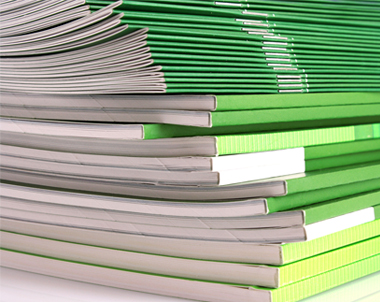 bigstock-Pile-of-green-magazines-isolat-16090412